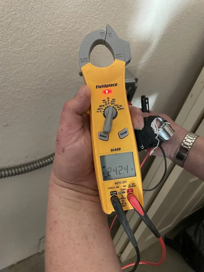 Voltage testing with clamp meter during Circuit Breaker Repair in Tulia